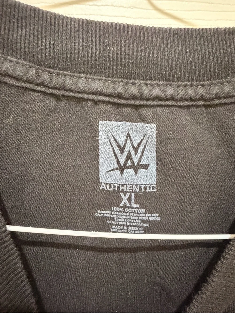 WWE Black Tee with Yellow, Pink, Green and Purple Theatrical Makeup Face
